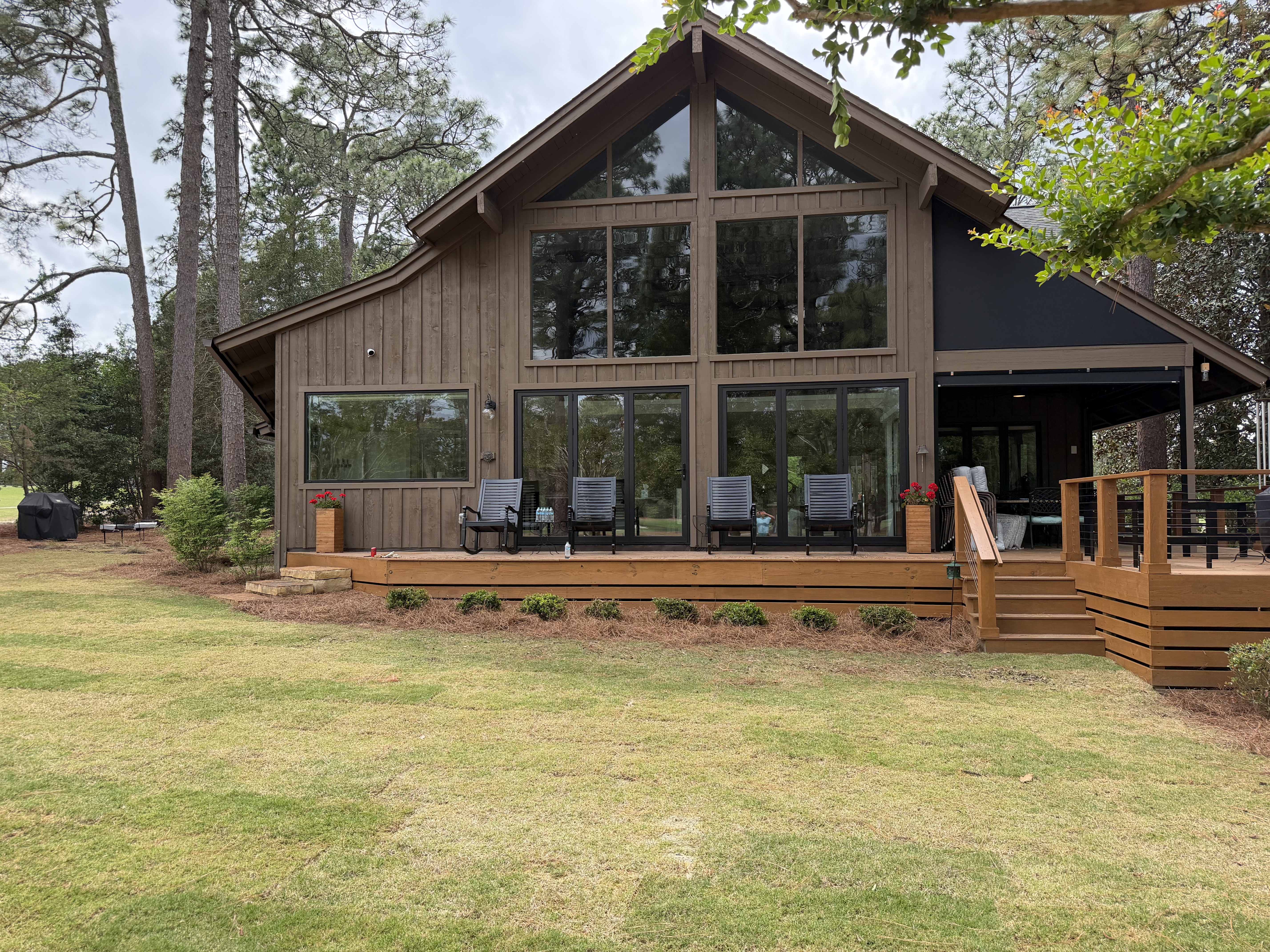 Lakefront property landscape renovation with lush lawn Moore County NC